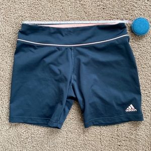 Charcoal grey adidas spandex with a peach pink lining.